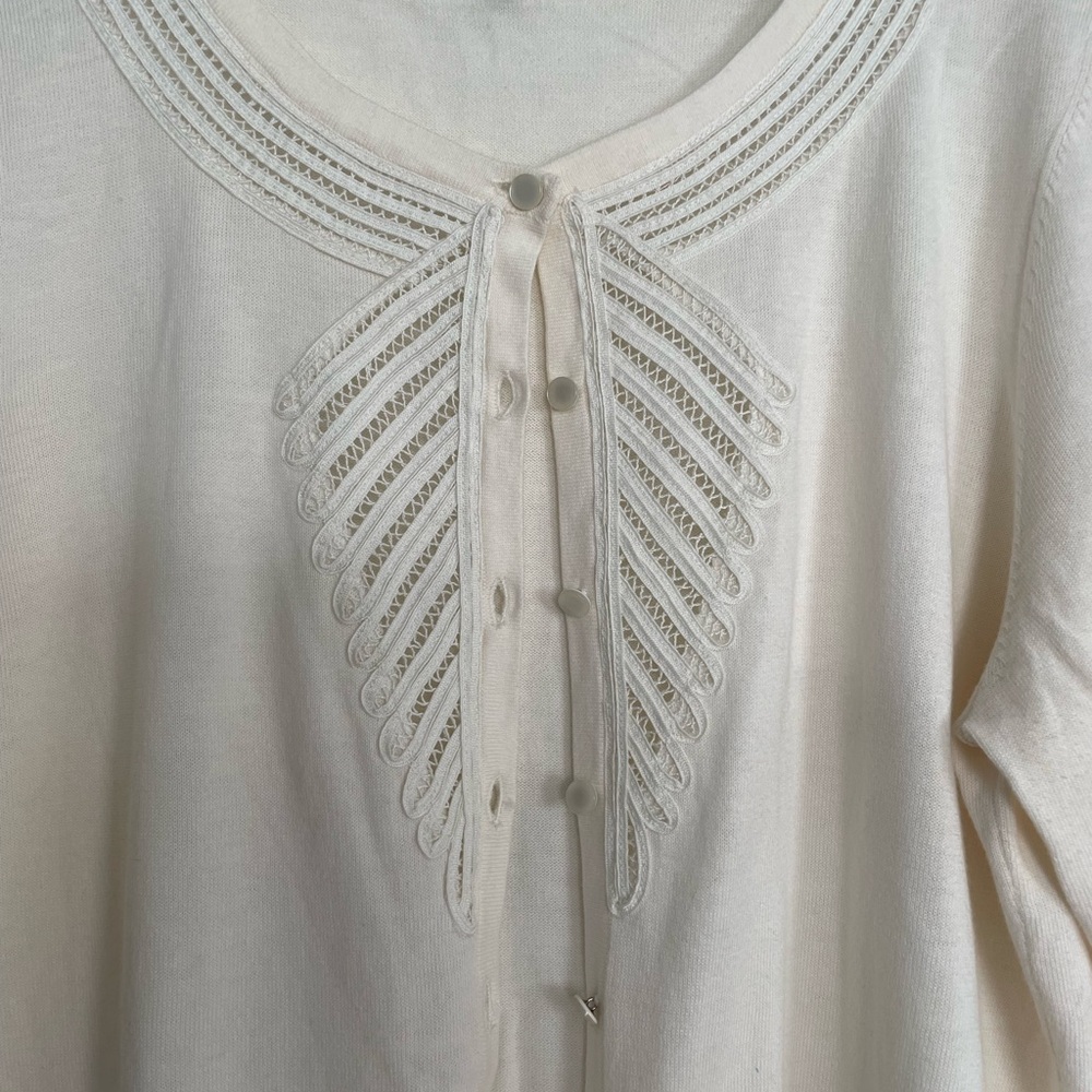 Striking cardigan w intricate detail; dressy or casual